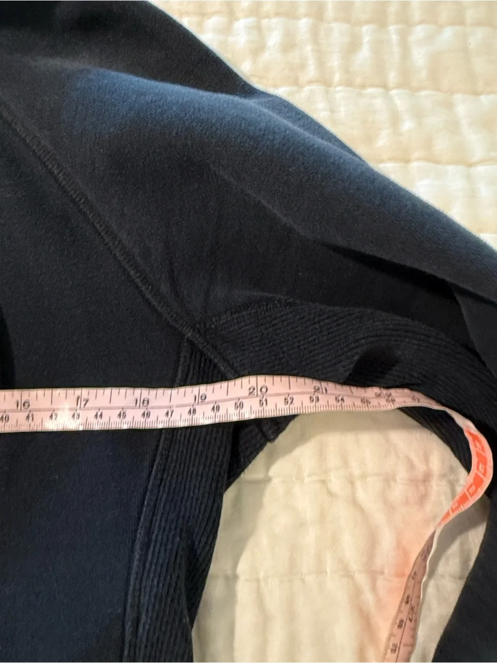 lululemon athletica. Special edition.  black jacket with ruffle trim and hood.
